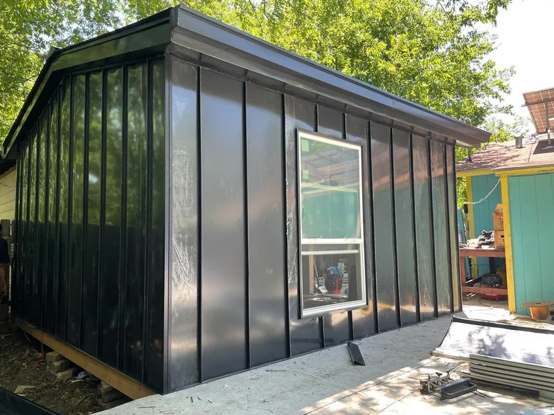 Black standing seam metal wall panels for Roof Inspection in Conneaut