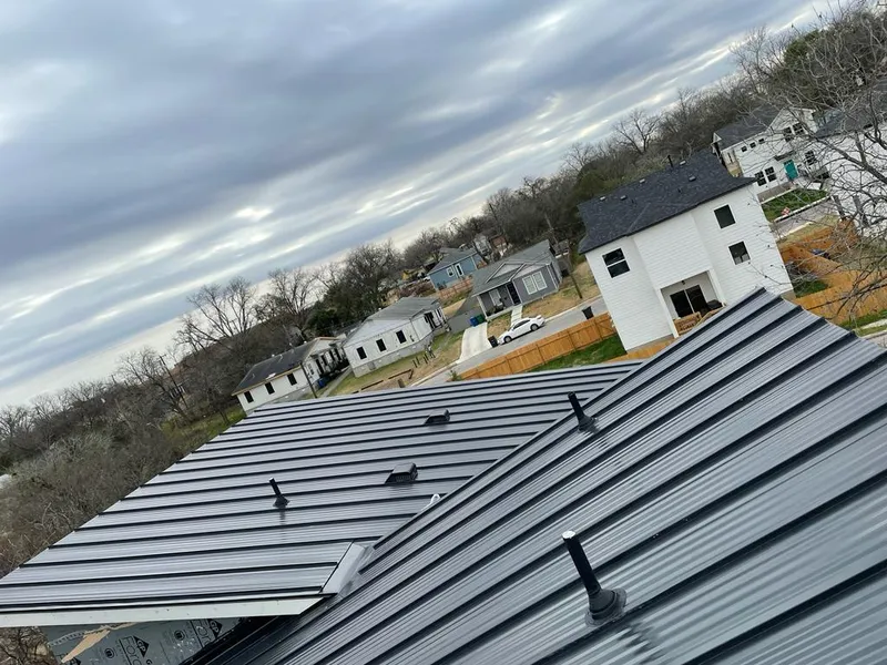 Standing seam metal roof panels with vents for Skylight Repair in Conneaut